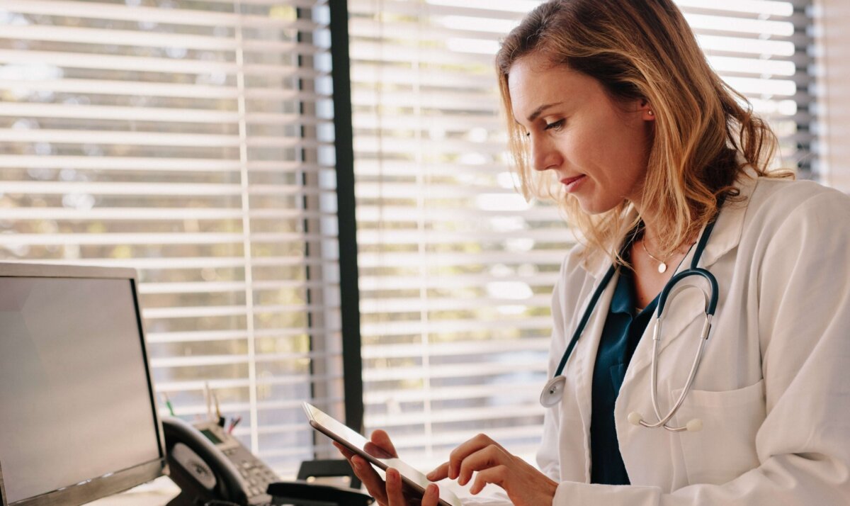 doctor reviewing a notice of hearing from the NC Medical Board